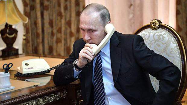 Путин провел телефонный разговор с Порошенко