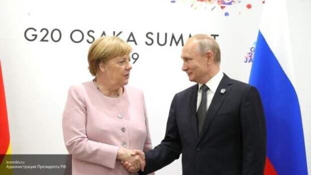 Путин и Меркель осудили попытки Украины загнать Минские соглашения в тупик